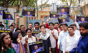 Atishi, AAP workers carrying insulin gather outside Tihar Jail