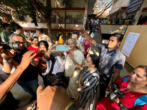 Voting for 14 LS seats underway in K’taka; Rahul Dravid, FM Nirmala Sitharaman among early voters