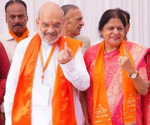 HM Amit Shah casts vote, urges people to ‘accept voting as duty’