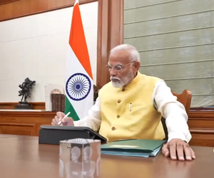 PM Modi signs first file for farmers’ welfare