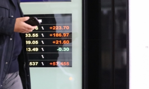 Tokyo stocks end mixed amid caution before Japan PM vote