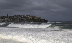 Storm hits Australia, causing property damage, flights cancellation