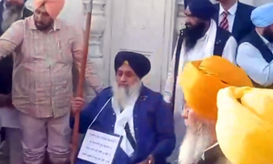 Sukhbir Badal serves Akal Takht punishment as guard at Golden Temple