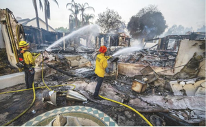 Firefighters continue battling LA wildfires amid dangerous weather warning