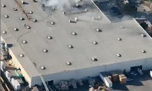 Small plane crashes into California building, claims two lives