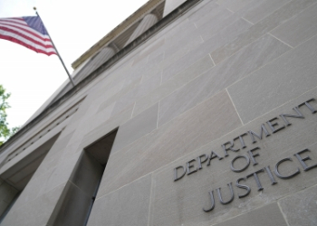 Two Chinese nationals charged in US with spying on naval bases, plotting to recruit spies