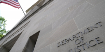 Two Chinese nationals charged in US with spying on naval bases, plotting to recruit spies