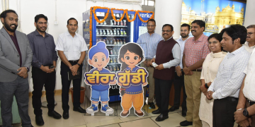 Chief Secretary K.A.P. Sinha launches state of the art vending machine dispensing Milkfed products