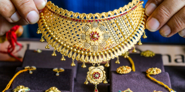 Gold dips 0.87 pc this week over stronger dollar, Fed rate hike expectations