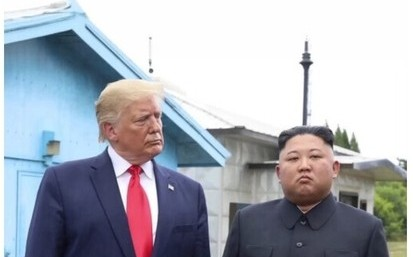 Trump posts photo with North Korean leader Kim, says ‘we get along great’